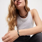 Leather bracelet with a green crystal
